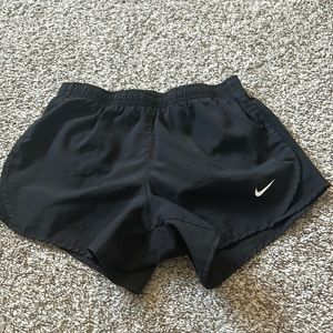 Nike black running shorts, size M kids